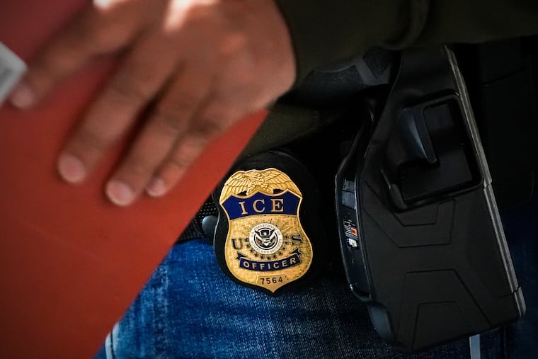 A deportation officer with Enforcement and Removal Operations in U.S. Immigration and Customs Enforcement's New York City field office conducts a brief before an early morning operation in the Bronx in December.