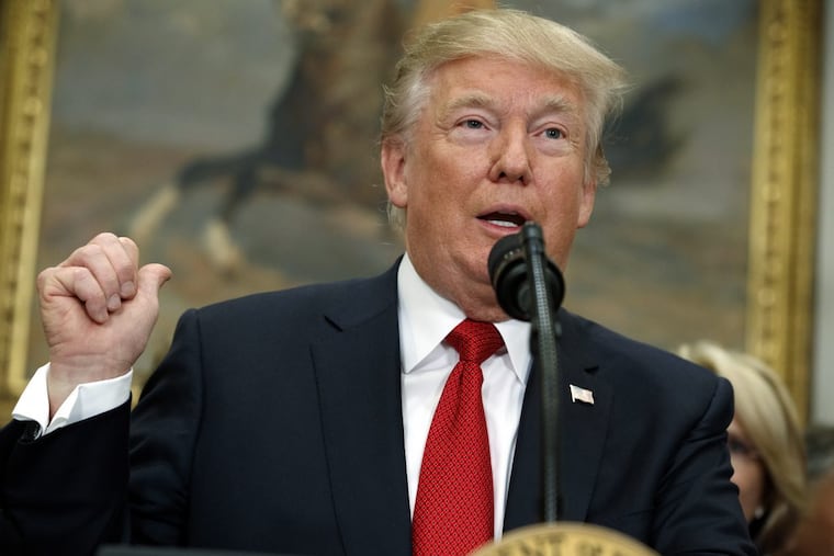 President Donald Trump speaks before signing an executive order on health care in the Roosevelt Room of the White House, Thursday, Oct. 12, 2017, in Washington.