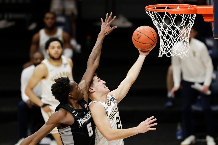 Villanova guard Collin Gillespie drives to the basket against Providence forward Jimmy Nichols Jr., in the second half.