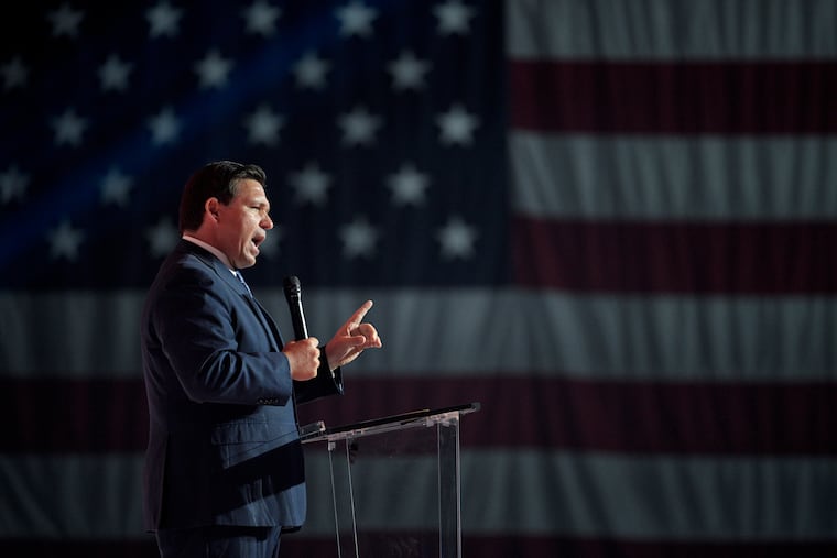 Florida Gov. Ron DeSantis addresses attendees during the Turning Point USA Student Action Summit in Tampa, Fla., in July.