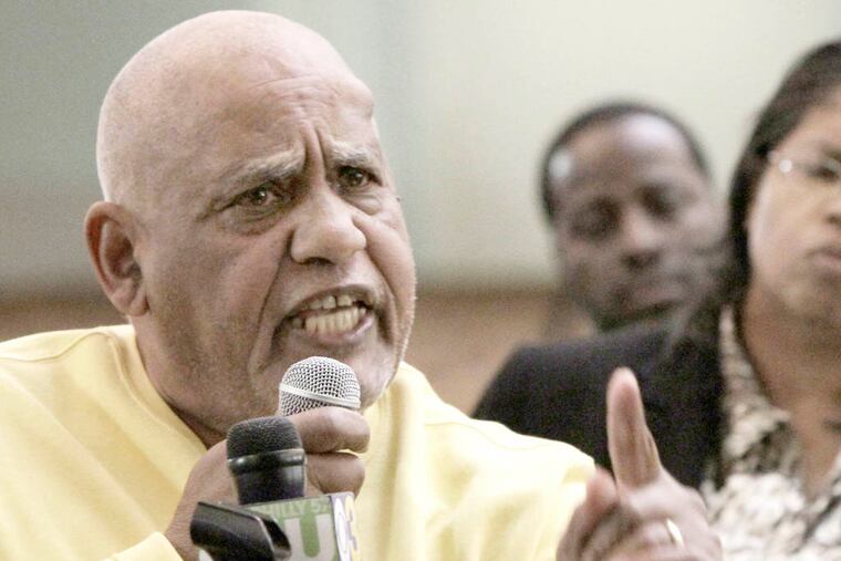 T. Milton Street speaks at an April 10 meeting over recent violence at Bartram High School. He’s done prison time for tax evasion, and now plans to run for mayor of Philadelphia.