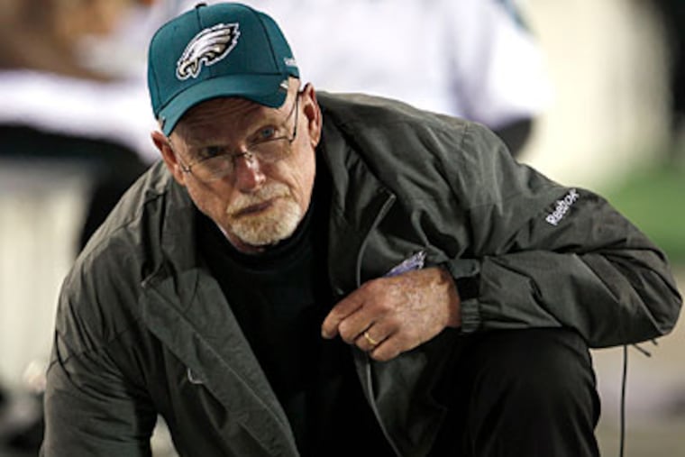 Defensive line coach Jim Washburn declined to comment on his spat with offensive coordinator Marty Mornhinweg. (Yong Kim/Staff Photographer)