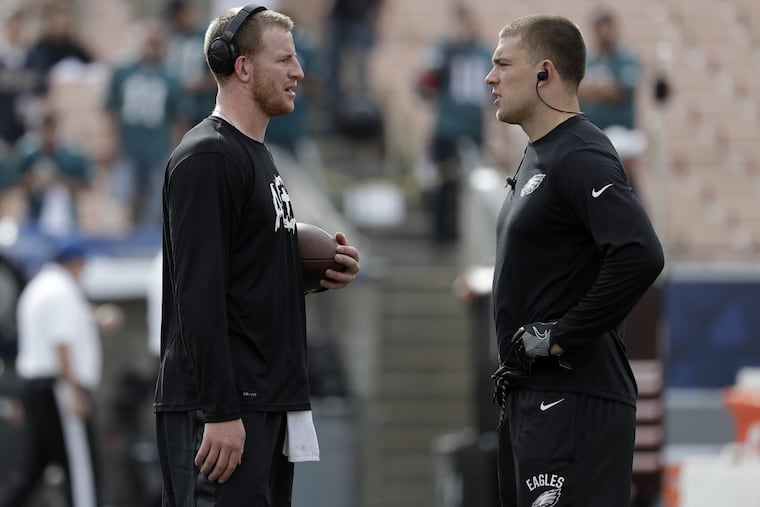 Eagles quarterback Carson Wentz with tight end Zach Ertz during pregame warm-ups before the Eagles play the Los Angeles Rams on Sunday, December 10, 2017. YONG KIM / Staff Photographer