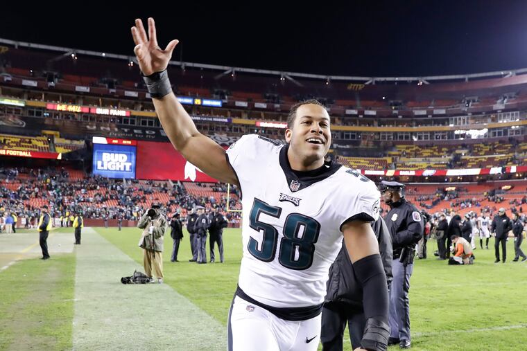 Eagles middle linebacker Jordan Hicks celebrates after the Eagles beat Washington on Sunday, December 30, 2018 in Landover, MD.