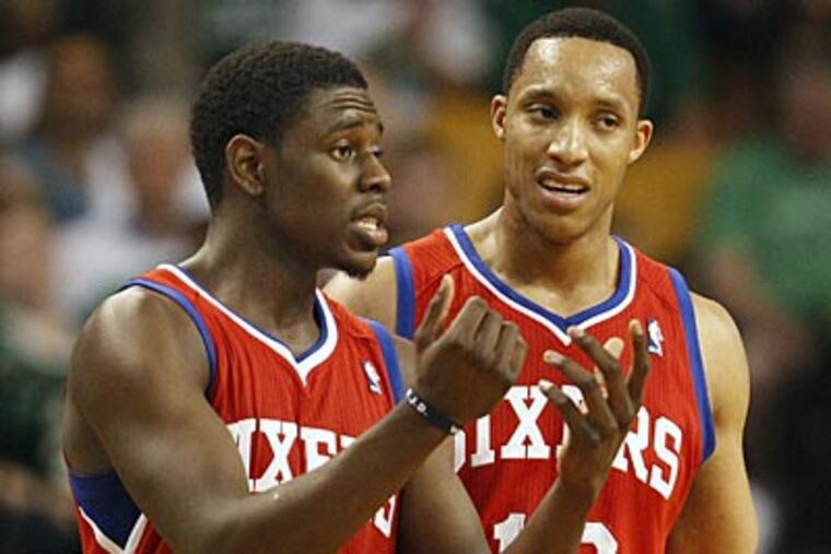 Jrue Holiday and Evan Turner struggled a bit under the bright lights of a Game 7 in Boston. (Ron Cortes/Staff Photographer)