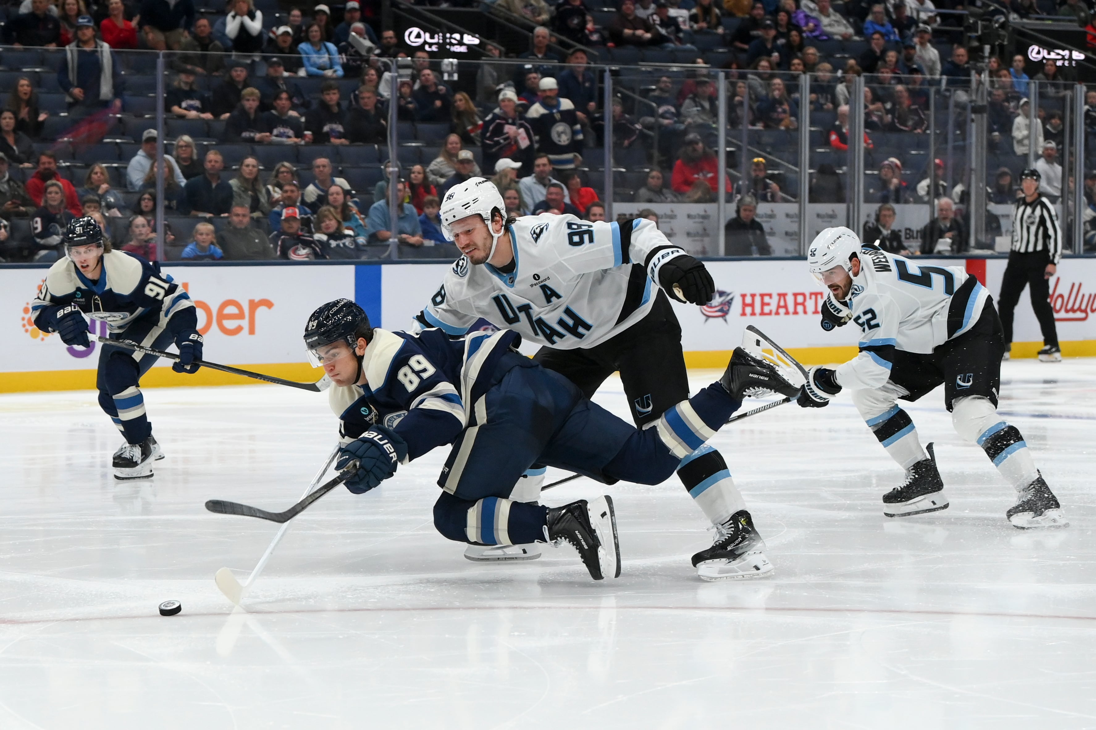 Mammoth defenseman Mikhail Sergachev leaves game vs. Devils after getting hit in helmet by puck