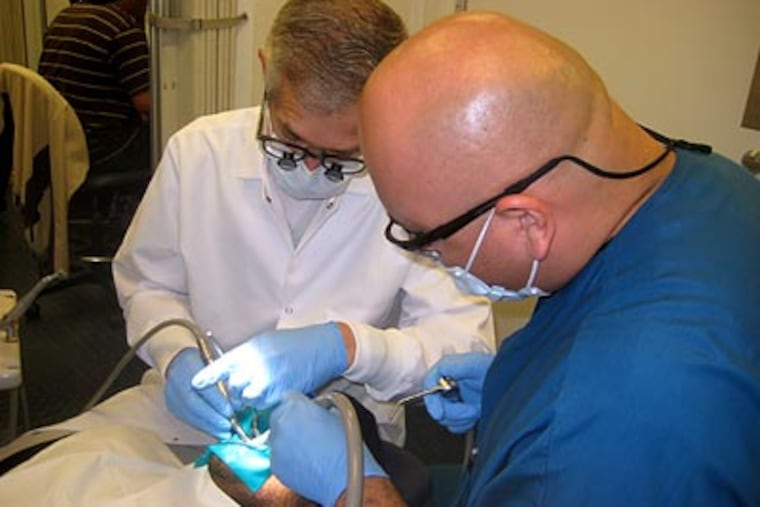 Roughly 85 percent of Americans have health insurance. Up to 80 percent are satisfied with their coverage. (Kristen Wyatt/AP)