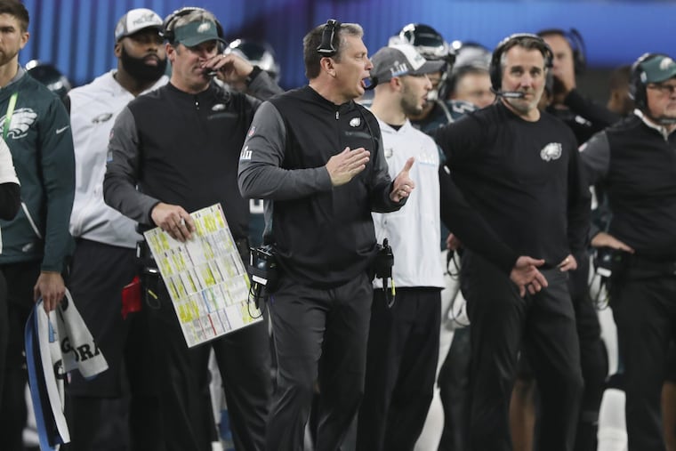 Philadelphia Eagles defensive coordinator Jim Schwartz (center) on the sideline during the Super Bowl matchup against the New England Patriots.