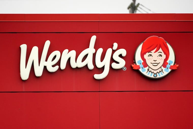 The Wendy's sign is seen at a restaurant in Pittsburgh last year.