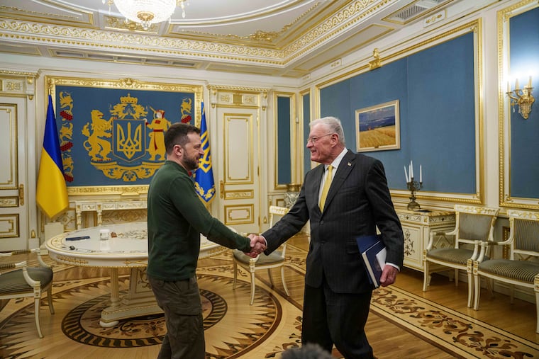 U.S. Special Envoy for Ukraine and Russia Keith Kellogg, right, and Ukraine's President Volodymyr Zelenskyy shake hands during their meeting in Kyiv, Ukraine, on Feb. 20, 2025.