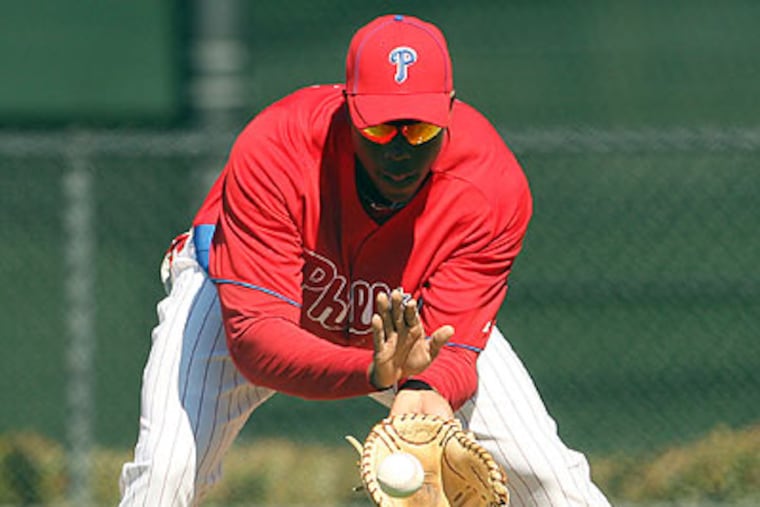 John Mayberry Jr. tried his hand at playing first base yesterday. (Yong Kim/Staff Photographer)