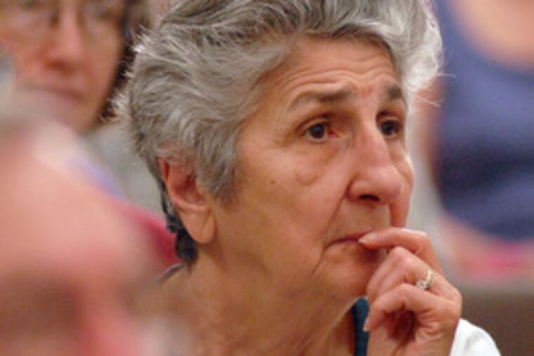 Alice Young of Woodlynne listens to Rendell and Lentz talk of rising energy costsand promote the governor's energy legislation.