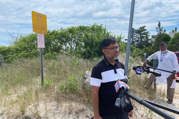 Mohammed Khalil, of Clementon, talks about his brother, Jabed Ikbal, 24, missing off the bay in Ocean City near the Longport Bridge.