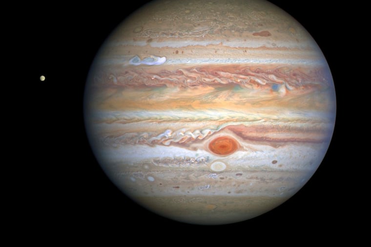 Jupiter, as seen by NASA’s Hubble Space Telescope. You probably won't get this good a view, but you might see a few of Jupiter's moons with decent binoculars.