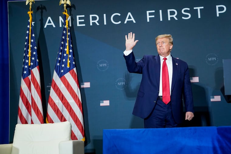 Former president Donald Trump, shown leaving the stage after speaking at the America First Agenda Summit on Tuesday in Washington.