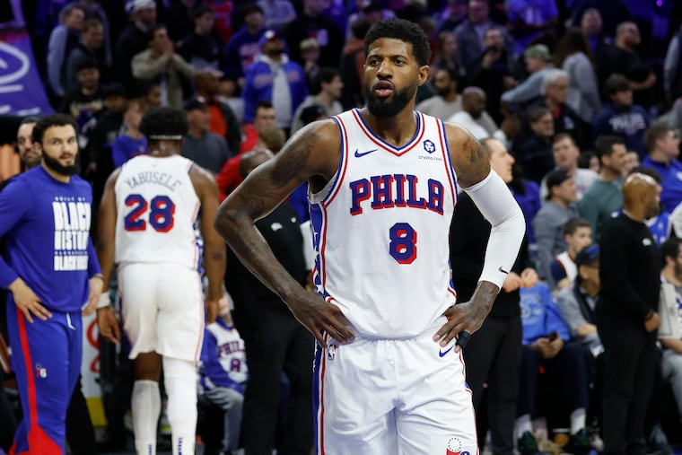 Sixers forward Paul George looks into the crowd after the Brooklyn Nets beat the Sixers on a last-second game-winning basket earlier this season in Philadelphia.