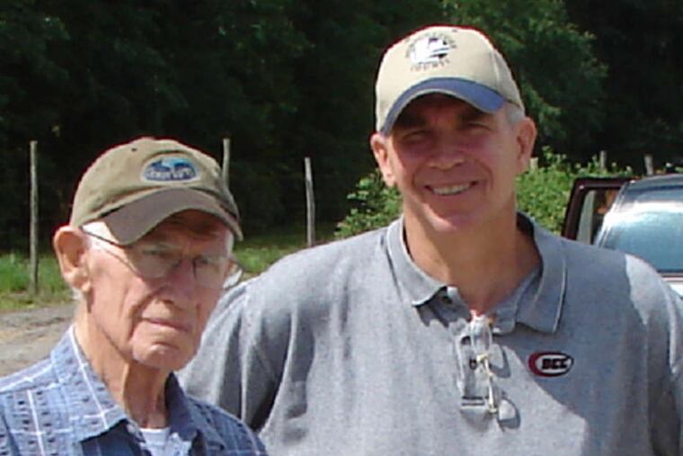 Bill Haines Jr. (left), with his father Bill Sr. in 2006 on the family's Haines' Pine Island Cranberry Co. operation.