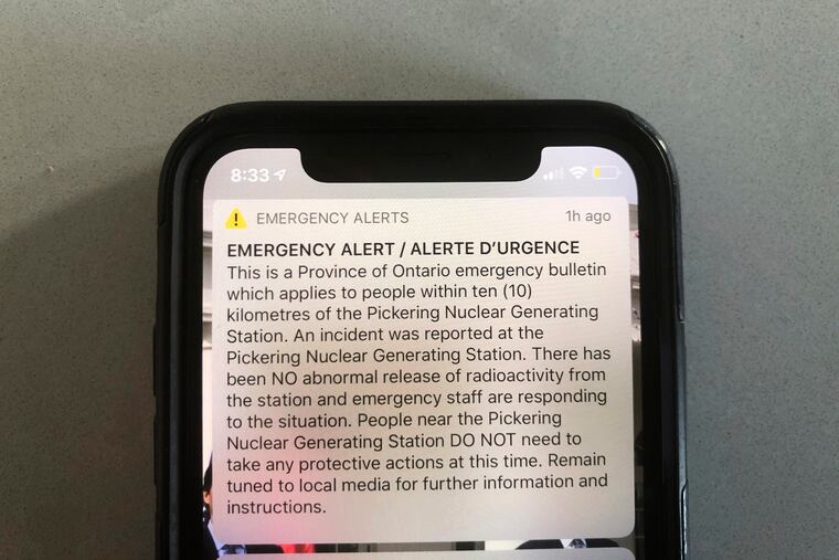 An emergency alert issued by the Canadian province of Ontario reporting an unspecified “incident” at a nuclear plant is shown on a smartphone Sunday. Ontario Power Generation later sent a message saying the alert “was sent in error." The initial message said the incident had occurred at the Pickering Nuclear Generating Station, though it added there had been no abnormal release of radioactivity from the station.