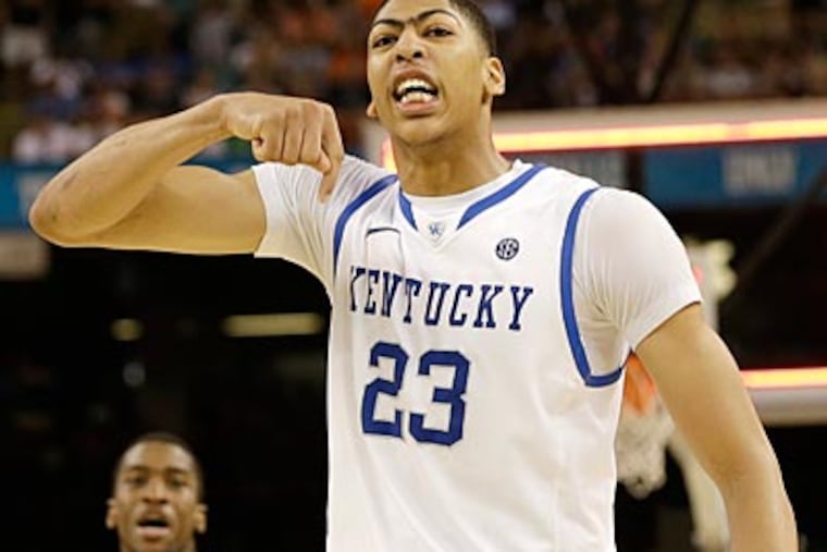 Anthony Davis celebrates as Kentucky defeated Louisville to advance to the national championship. (David J. Phillip/AP)