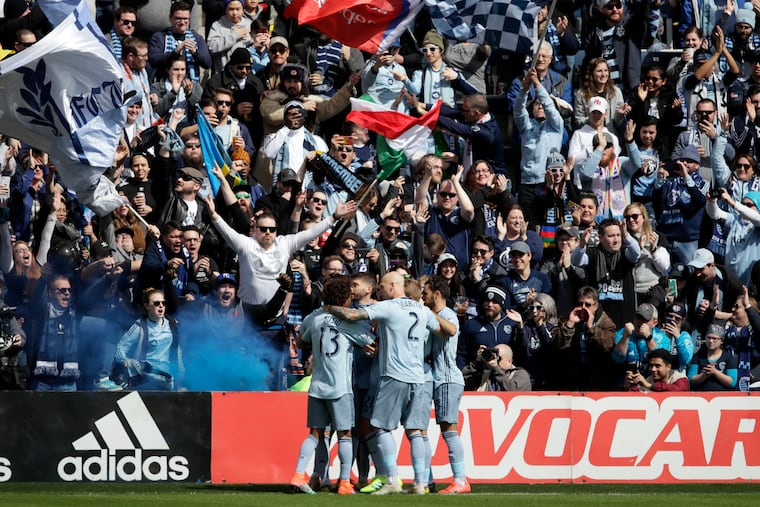 Sporting Kansas City players celebrate after Ilie Sánchez's first half penalty kick gave their team the lead against the Philadelphia Union.