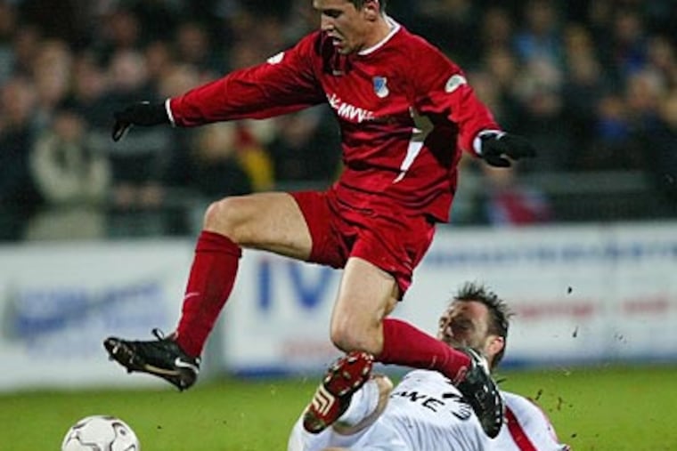Kai Herdling (top) is on loan from TSG Hoffenheim until June 30. (Daniel Maurer/AP)