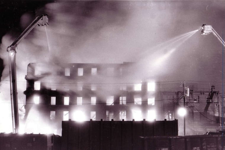 A vacant building ablaze at Fourth and Brown, at the Karff-Eisemann Co. industrial complex, in 1986.
