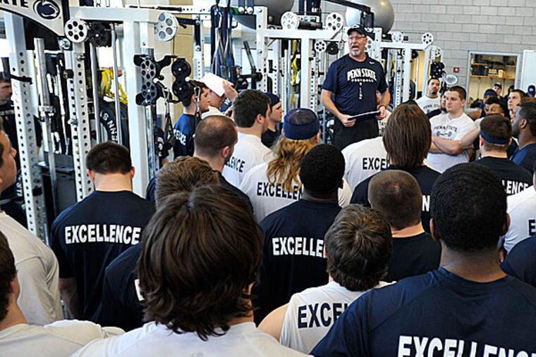 Dwight Galt, Penn State Football Director of Performance Enhancement,
leads a strength and conditioning workout Monday, March 3, 2014, in
University Park, Pa. Media had access to a team workout Monday. (AP Photo/Centre Daily Times, Nabil K.Mark)