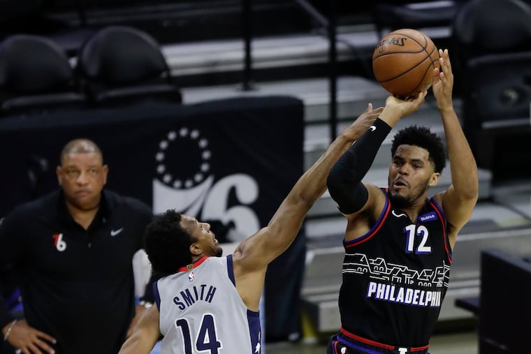 Sixers forward Tobias Harris, at 6-foot-8, shoots over the Wizards' Ish Smith, who is 6-foot. THe Sixers have enjoyed a height advantage against Washington in the Eastern Conference quarterfinals.