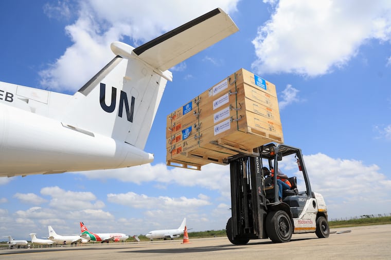 Workers load World Health Organization (WHO) emergency supplies onto a United Nations plane in Nairobi, Kenya, Wednesday, May 20, 2026, headed for Congo to combat the Ebola outbreak in Ituri province.