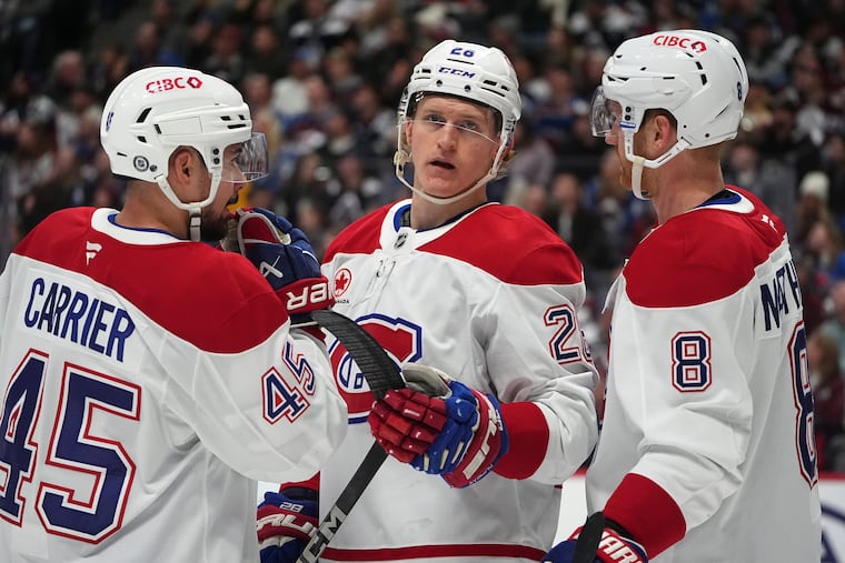Christian Dvorak (center) was a beloved teammate and mentor during his four years in Montreal.