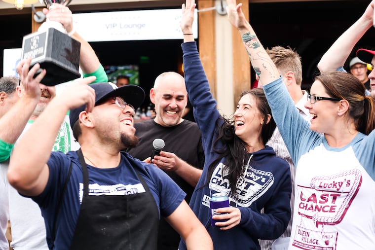 Organizer Rob Wasserman (center) with the crew from Lucky's Last Chance, which has won prizes at several Burger Brawl events.