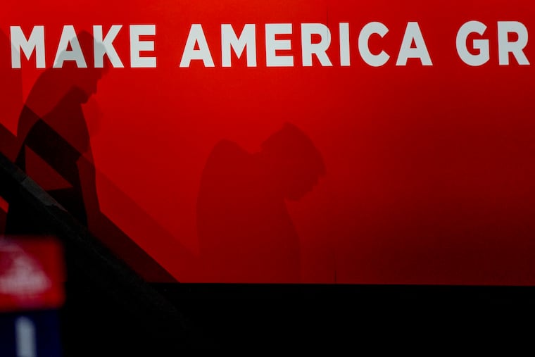 Republican presidential candidate former President Donald Trump's shadow is seen as he departs the Republican National Convention on Wednesday in Milwaukee.