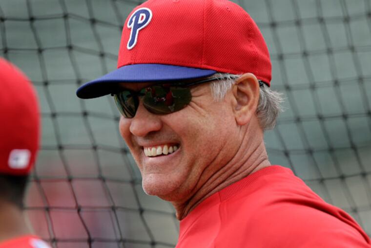 Ryne Sandberg stands outside the batting cage before a baseball spring training exhibition game against the Baltimore Orioles, Sunday, March 3, 2013, in Sarasota, Fla. (Charlie Neibergall/AP)