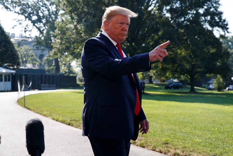 President Donald Trump talks with reporters before departing for an event to celebrate the 400th anniversary celebration of the first representative assembly at Jamestown, on the South Lawn of the White House, Tuesday, July 30, 2019, in Washington.