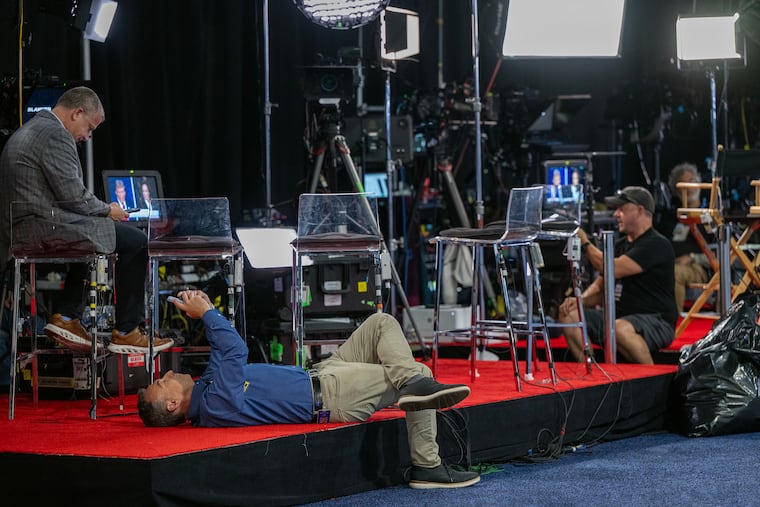 Television staff in the spin room at the Convention Center wait for the completion of the debate between former President Donald Trump and Vice President Kamala Harris Sept. 10, 2024.
