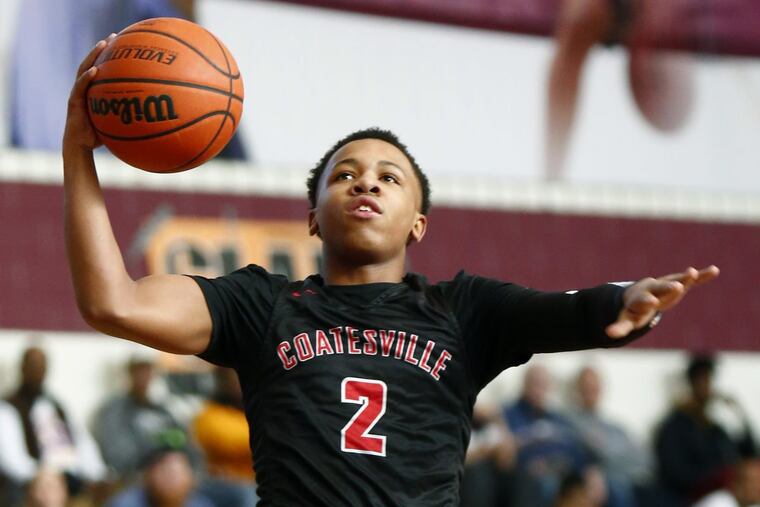 Coatesville’s Jhamir Brickus drives to the basket against Shipley on Saturday.