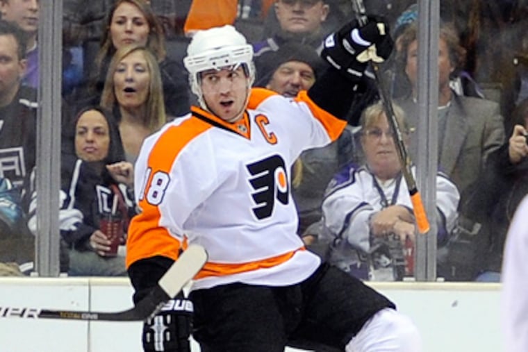 Flyers center Mike Richards celebrates one of his two goals in Thursday night's win over the Kings. (AP Photo/Mark J. Terrill)