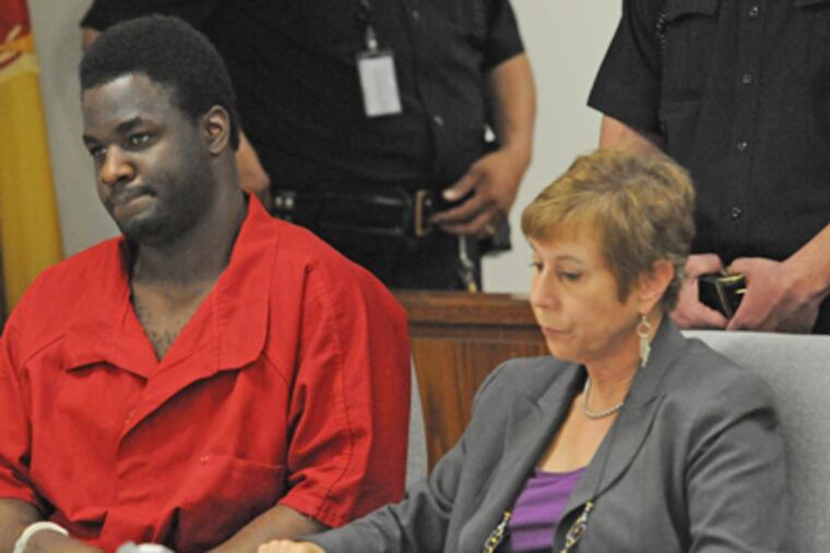 Martin Pierce during his sentencing with his lawyer, Jill Cohen, next to him. (April Saul / Staff Photographer)