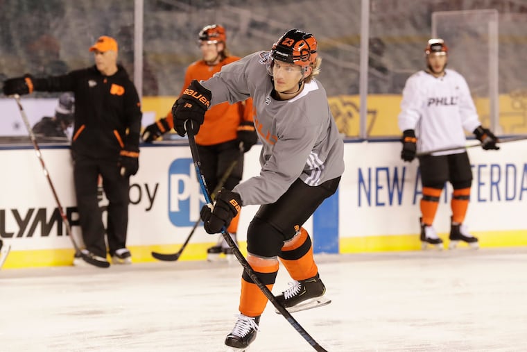 Flyers left wing Oskar Lindblom shoots the puck during practice at Lincoln Financial Field on Friday. Weather conditions could make things quite interesting for sports bettors.