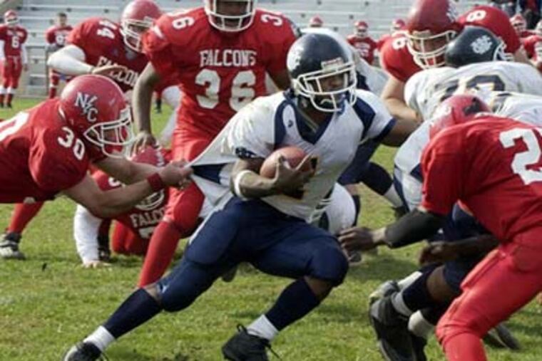 West Catholic's Curtis Brinkley in the October 2002 game against North Catholic in which he set the city's single-game rushing record with 399 yards.
