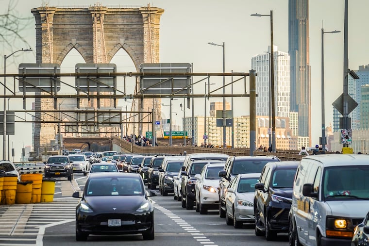 Traffic enters lower Manhattan after crossing the Brooklyn Bridge on Feb. 8, 2024.
