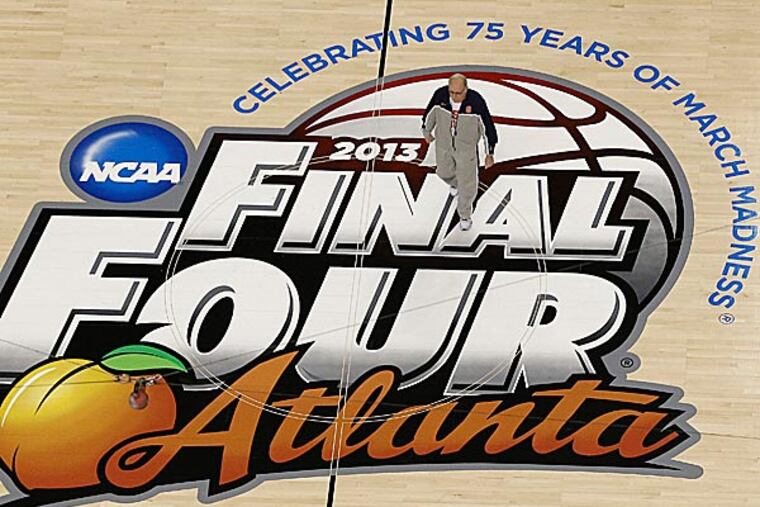 Saturday night's Final Four at the Georgia Dome gave us a comeback from a team striving for greatness against an underdog team that played great, followed by a team that attacked a defense that seemed impregnable and held on as the clock approached midnight. (Tim Donnelly/AP)