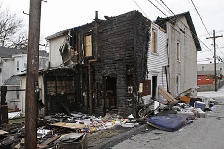 Federal investigators have recorded 70 arsons in the Coatesville area since February 2008, including this one at West Diamond and North Church Streets in January. (Michael S. Wirtz/Staff Photographer)