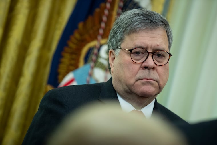 Attorney General William Barr listens as President Donald Trump speaks during an event to sign an executive order establishing the Task Force on Missing and Murdered American Indians and Alaska Natives, in the Oval Office of the White House, Tuesday, Nov. 26, 2019, in Washington.