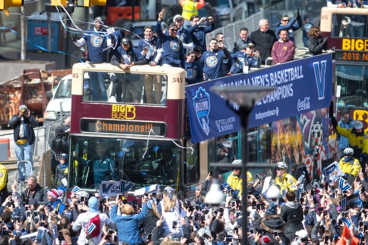 The Villanova men’s basketball team celebrates along Market Street during the parade for the 2018 NCAA champions.