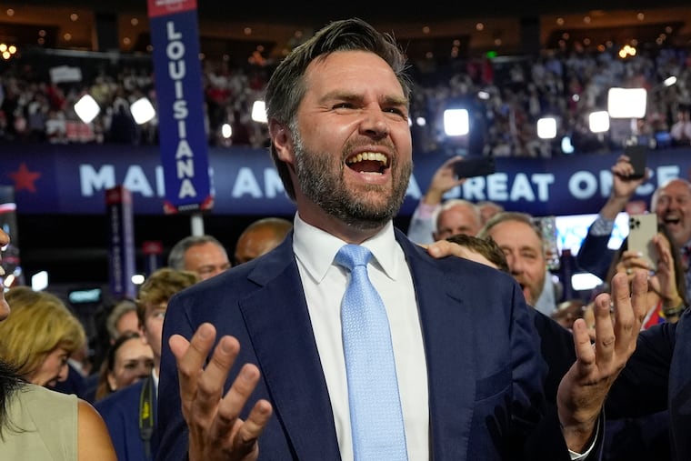 Republican vice presidential candidate Sen. JD Vance, (R., Ohio) arrives on the floor during the first day of the 2024 Republican National Convention Monday in Milwaukee.