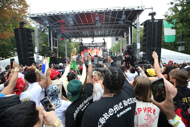 Fans dance during the 26 AR set on the Tidal Stage during the Made in America festival in 2021.