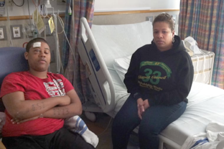 Montez Wilmer, 17, and his mother, Christina Turner-Johnson, in his room at Children’s Hospital of Philadelphia. (Tom Gralish / Staff Photographer)
