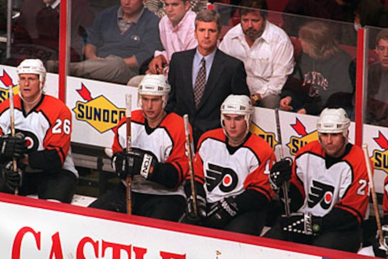 Terry Murray was 118-64-30 behind the Flyers' bench from 1994-97. He also played for the team. (File photo)