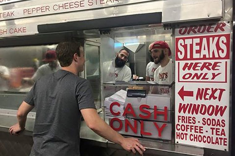 Mark Zuckerberg at the window of Pat’s King of Steaks in South Philadelphia on Sept. 24, 2017.